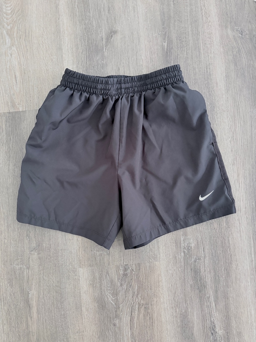 Nike Boy’s Black Athletic Shorts with White Swoosh